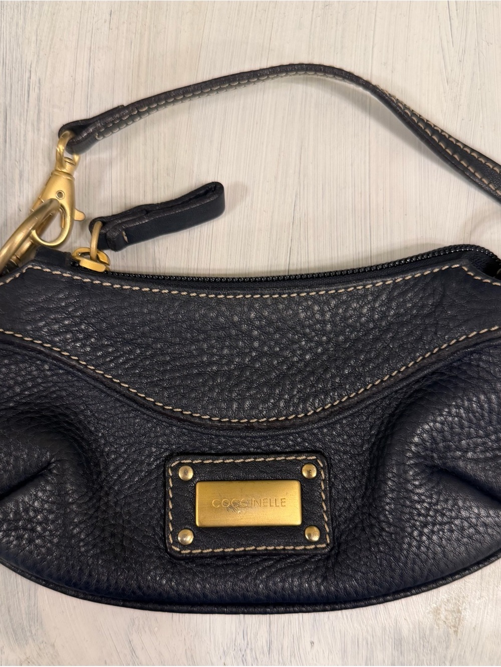 Coccinelle Dark Blue Pebbled Leather mini bag with Gold Hardware